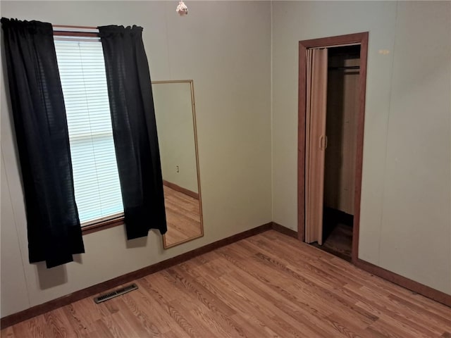 6113 Rte 46, Keating Town, PA 16749 - unfurnished bedroom with light wood finished floors and multiple windows