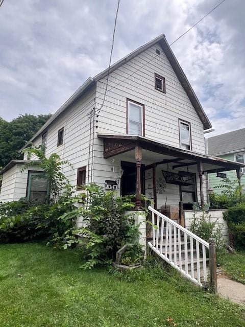 67 Perry Ave, Corning City, NY 14830 - rear view of property with covered porch and a yard