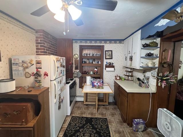 67 Perry Ave, Corning City, NY 14830 - kitchen with wallpapered walls, open shelves, white appliances, ceiling fan, and light countertops