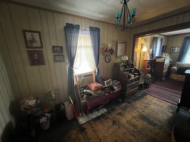 67 Perry Ave, Corning City, NY 14830 - bedroom with wood finished floors and a chandelier