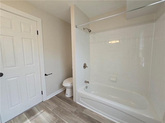 2381 Culver Rd, Irondequoit, NY 14609 - bathroom featuring washtub / shower combination and wood finished floors