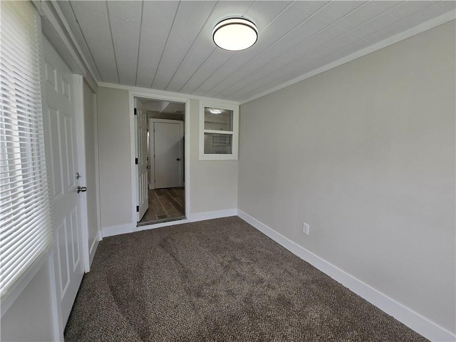 2381 Culver Rd, Irondequoit, NY 14609 - unfurnished bedroom featuring dark colored carpet and wooden ceiling