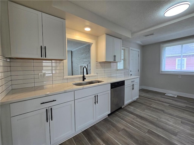 2381 Culver Rd, Irondequoit, NY 14609 - kitchen featuring stainless steel dishwasher, a textured ceiling, white cabinetry, dark wood finished floors, and light stone countertops