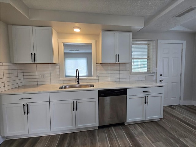 2381 Culver Rd, Irondequoit, NY 14609 - kitchen with dishwasher, white cabinetry, dark wood-style flooring, a textured ceiling, and light stone countertops