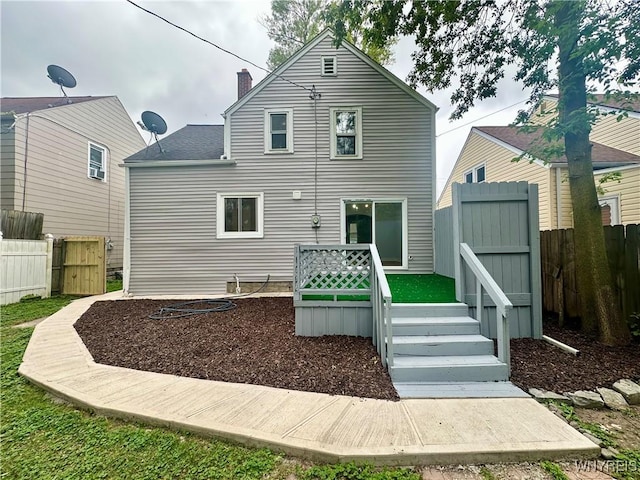 1433 Eggert Rd, Amherst, NY 14226 - back of property with a chimney