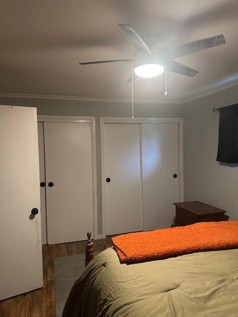 402 E Water St, Smethport Boro, PA 16749 - bedroom with multiple closets, wood finished floors, crown molding, and ceiling fan