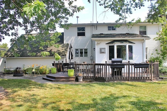 37 Woodmar Ter, West Seneca, NY 14224 - back of house featuring a wooden deck, a lawn, and a shingled roof