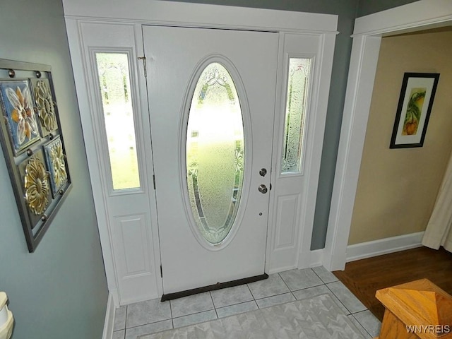 37 Woodmar Ter, West Seneca, NY 14224 - entrance foyer featuring light tile patterned flooring and baseboards
