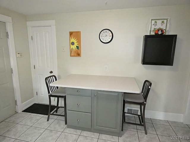 37 Woodmar Ter, West Seneca, NY 14224 - dining space with light tile patterned flooring and baseboards