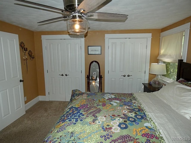 37 Woodmar Ter, West Seneca, NY 14224 - carpeted bedroom featuring two closets and a ceiling fan