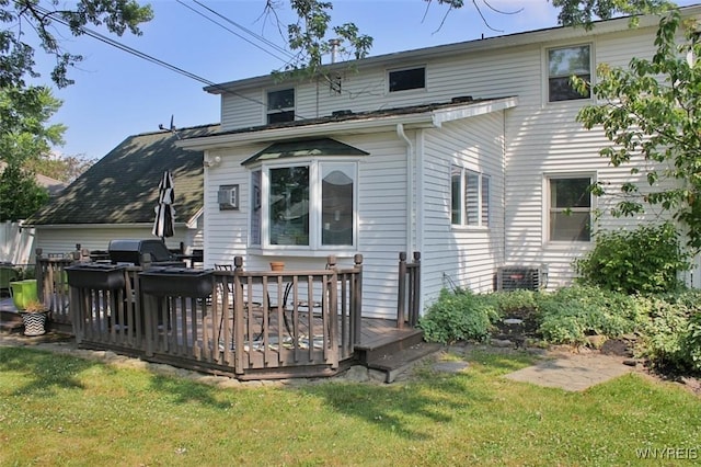 37 Woodmar Ter, West Seneca, NY 14224 - back of property with a deck and a yard