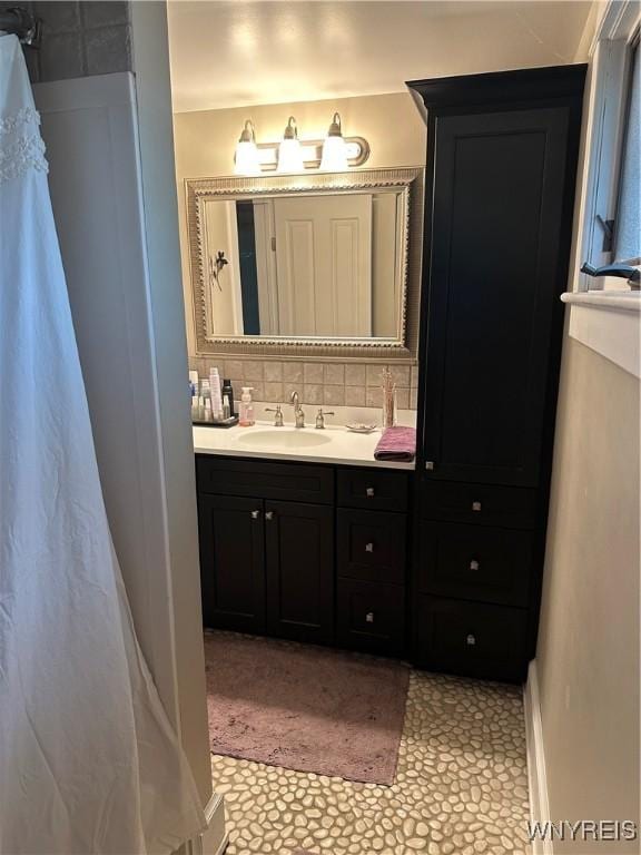 37 Woodmar Ter, West Seneca, NY 14224 - full bath featuring vanity and decorative backsplash