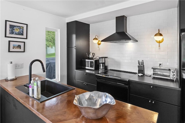2064 County Highway 8, Roxbury, NY 12421 - kitchen featuring wall chimney range hood, stainless steel microwave, electric range oven, dark cabinetry, and dark countertops