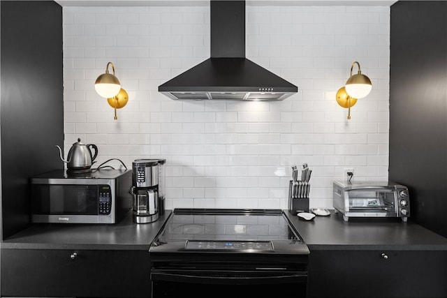 2064 County Highway 8, Roxbury, NY 12421 - kitchen featuring wall chimney range hood, stainless steel microwave, black electric range, dark countertops, and decorative backsplash