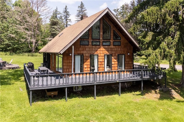 2064 County Highway 8, Roxbury, NY 12421 - back of property with a deck, roof with shingles, a chimney, and a lawn