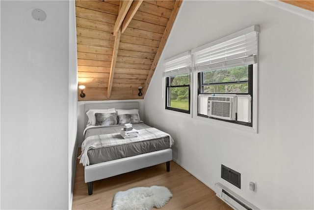 2064 County Highway 8, Roxbury, NY 12421 - bedroom with wooden ceiling, wood finished floors, cooling unit, and a baseboard heating unit