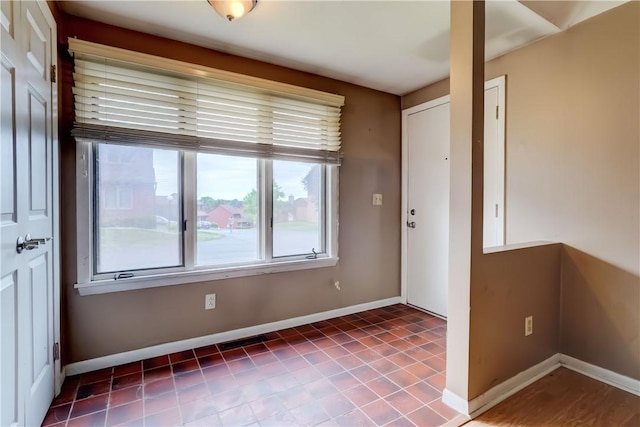 21 Spring Hl, Perinton, NY 14450 - tiled empty room with baseboards