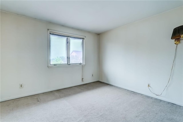 21 Spring Hl, Perinton, NY 14450 - carpeted empty room with baseboards