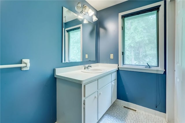 21 Spring Hl, Perinton, NY 14450 - bathroom featuring vanity, healthy amount of natural light, and tile patterned flooring