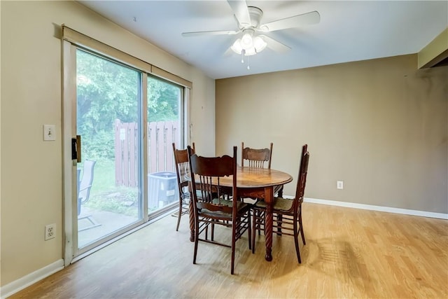 21 Spring Hl, Perinton, NY 14450 - dining space with light wood finished floors and a ceiling fan