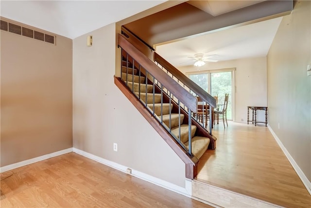 21 Spring Hl, Perinton, NY 14450 - staircase featuring wood finished floors and a ceiling fan