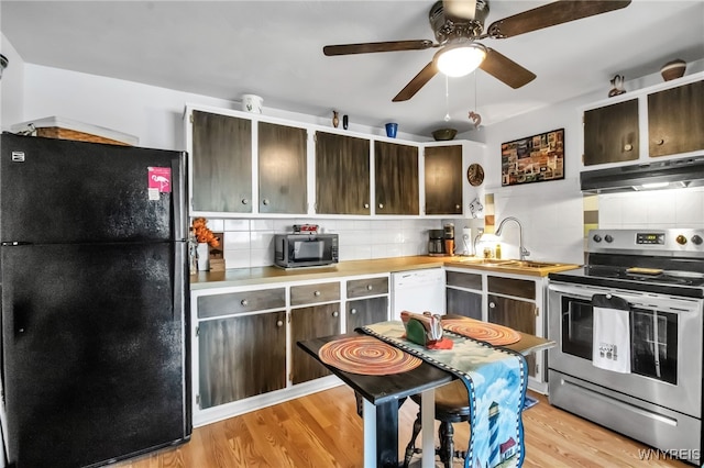 51 S 86th St Unit 10B, Niagara Falls, NY 14304 - kitchen featuring freestanding refrigerator, stainless steel electric range oven, under cabinet range hood, white dishwasher, and light wood-style flooring