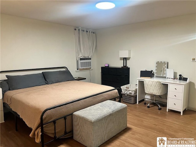 3420 Riverside Dr, Scio, NY 14895 - bedroom featuring light wood-type flooring, cooling unit, and a desk