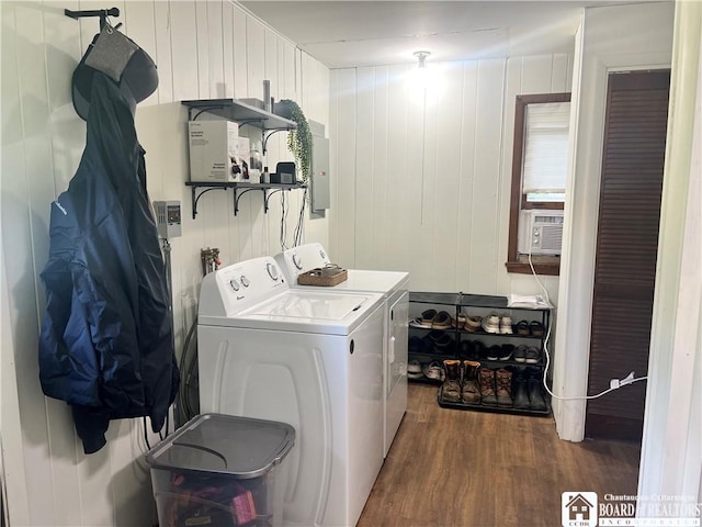 3420 Riverside Dr, Scio, NY 14895 - laundry area featuring washer and dryer, dark wood-style flooring, electric panel, and cooling unit
