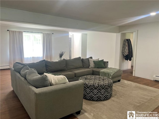 3420 Riverside Dr, Scio, NY 14895 - living room with a baseboard radiator and wood finished floors