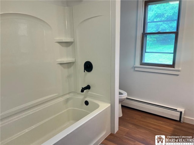 3420 Riverside Dr, Scio, NY 14895 - bathroom featuring a baseboard heating unit, wood finished floors, and bathtub / shower combination