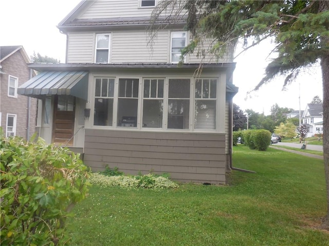 45 Olin Ave, Perry, NY 14530 - view of side of home featuring a yard