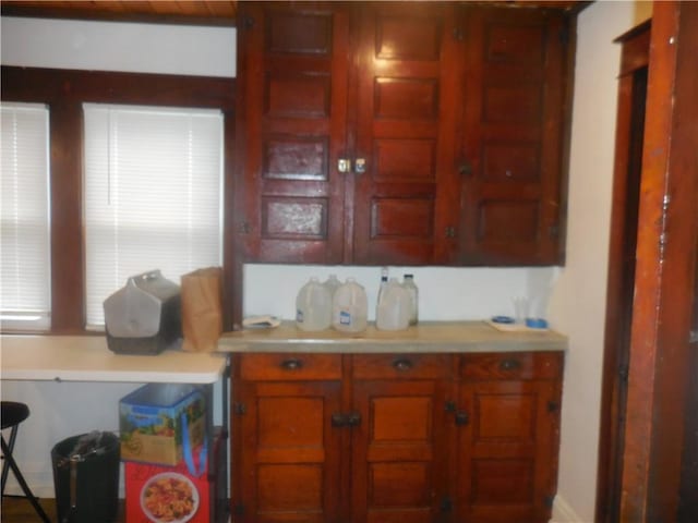 45 Olin Ave, Perry, NY 14530 - kitchen with light countertops and brown cabinetry