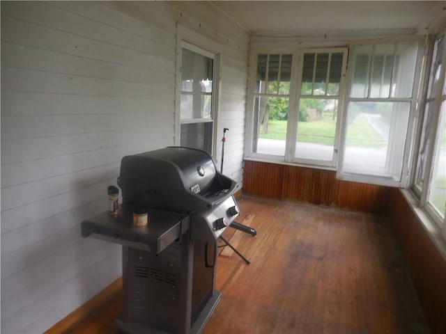 45 Olin Ave, Perry, NY 14530 - sunroom / solarium featuring hardwood / wood-style floors and wooden walls