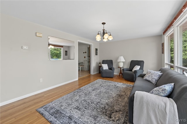 8500 Pools Brook Rd, Manlius, NY 13082 - living room featuring a chandelier and wood finished floors