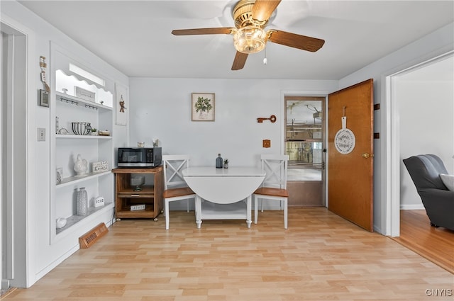 8500 Pools Brook Rd, Manlius, NY 13082 - dining area featuring light wood-style floors and ceiling fan