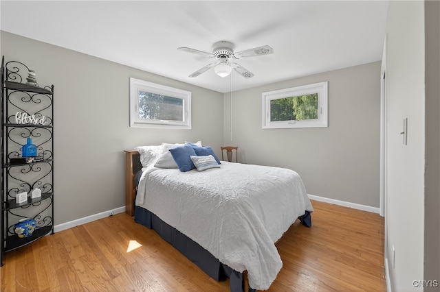 8500 Pools Brook Rd, Manlius, NY 13082 - bedroom featuring light wood-style floors and a ceiling fan