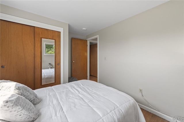 8500 Pools Brook Rd, Manlius, NY 13082 - bedroom with a closet and wood finished floors
