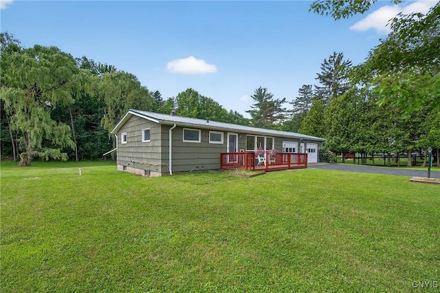 8500 Pools Brook Rd, Manlius, NY 13082 - view of front of house featuring a deck, a front yard, driveway, and a metal roof