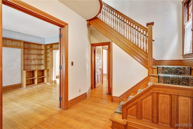 499 Breckenridge St, Buffalo, NY 14213 - staircase with wood finished floors and built in shelves
