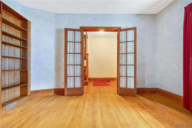 499 Breckenridge St, Buffalo, NY 14213 - empty room featuring wood finished floors and french doors