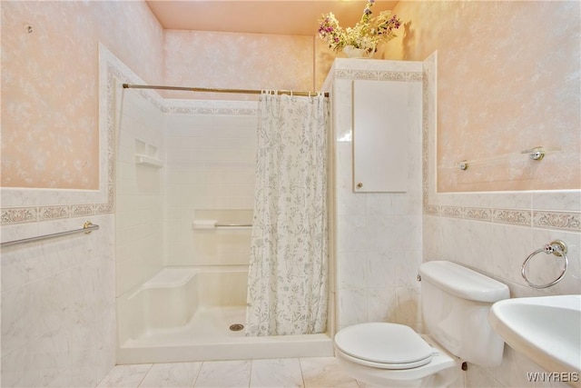 499 Breckenridge St, Buffalo, NY 14213 - full bath featuring tile walls, a shower stall, wainscoting, and marble finish floors