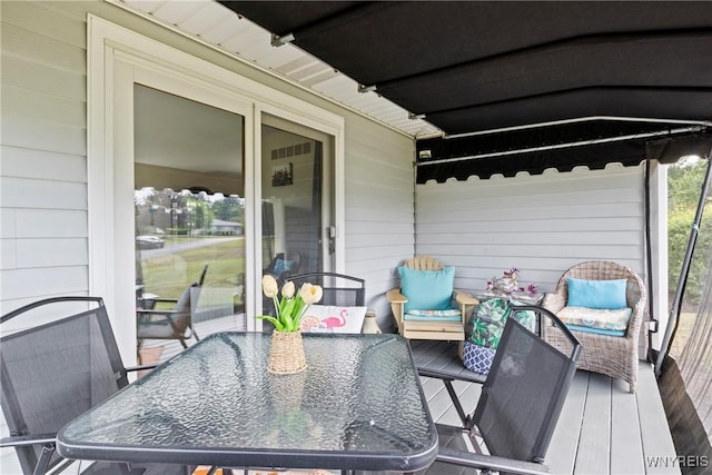 5861 Goodrich Rd Unit 6C, Clarence, NY 14032 - wooden deck with outdoor dining space