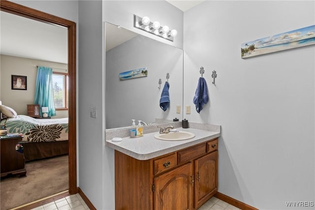 5861 Goodrich Rd Unit 6C, Clarence, NY 14032 - bathroom featuring vanity, connected bathroom, and tile patterned flooring