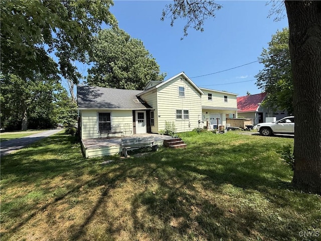 352 S Real St, Cape Vincent, NY 13618 - rear view of house with a yard