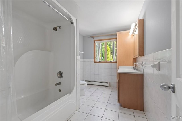 6924 Todd Way, Salina, NY 13088 - full bathroom featuring tile walls, a baseboard heating unit, vanity, tile patterned floors, and wainscoting