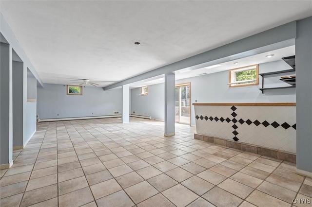 6924 Todd Way, Salina, NY 13088 - below grade area with ceiling fan, tile patterned flooring, and baseboard heating
