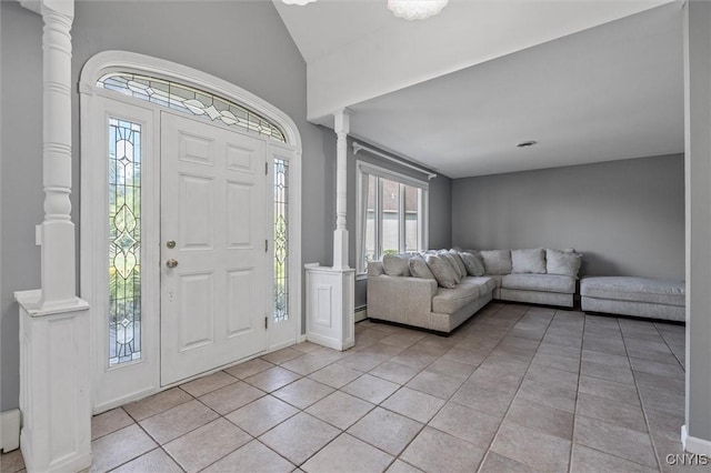 6924 Todd Way, Salina, NY 13088 - foyer with light tile patterned flooring, decorative columns, vaulted ceiling, and baseboard heating