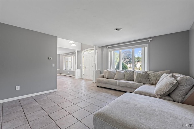 6924 Todd Way, Salina, NY 13088 - living area with light tile patterned floors and baseboard heating