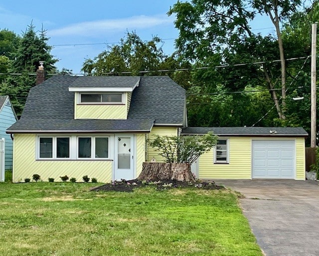 232 Almay Rd, Greece, NY 14616 - view of front of property featuring a front lawn, driveway, a garage, and a chimney