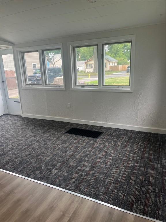 232 Almay Rd, Greece, NY 14616 - spare room with wood finished floors